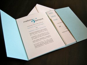 A wedding invitation package.